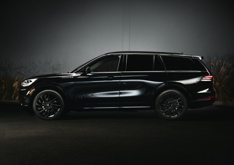 A 2024 Lincoln Aviator® SUV is shown in the Infinite Black exterior color | Rogers Lincoln in Midland TX