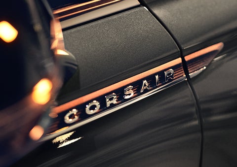 The stylish chrome badge reading “CORSAIR” is shown on the exterior of the vehicle. | Rogers Lincoln in Midland TX