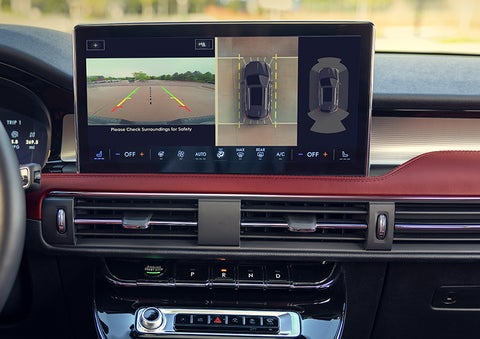 The driver of a 2024 Lincoln Corsair® SUV is shown selecting the drive mode. | Rogers Lincoln in Midland TX