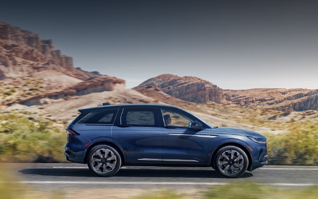 A 2024 Lincoln Nautilus® SUV is being driven in a desert setting. | Rogers Lincoln in Midland TX