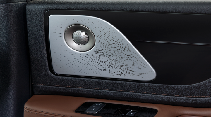 A close-up of a speaker located on the door’s interior is shown. | Rogers Lincoln in Midland TX