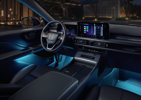 Deep blue ambient lighting glows from various places within a 2025 Lincoln Aviator® SUV. | Rogers Lincoln in Midland TX