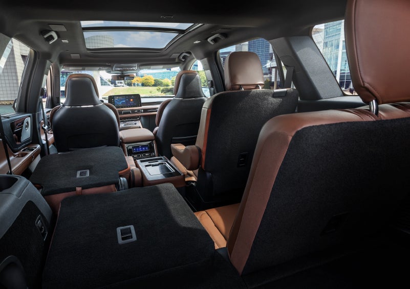 The interior of the 2025 Lincoln Aviator® SUV is shown with two seats folded down for added space. | Rogers Lincoln in Midland TX