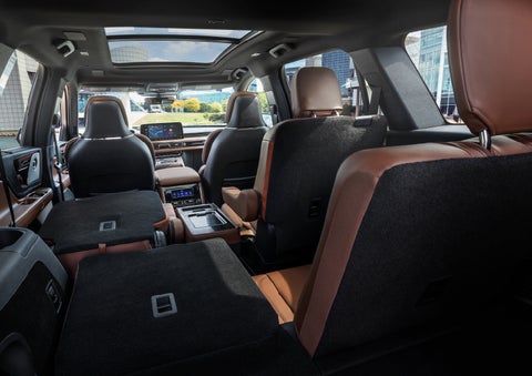 The interior of the 2025 Lincoln Aviator® SUV is shown with two seats folded down for added space. | Rogers Lincoln in Midland TX