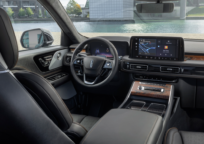 The interior of the 2025 Lincoln Aviator® SUV is shown parked with a view of a harbor through the windshield. | Rogers Lincoln in Midland TX