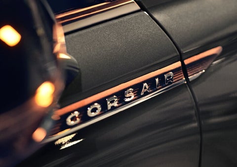 The stylish chrome badge reading “CORSAIR” is shown on the exterior of the vehicle. | Rogers Lincoln in Midland TX