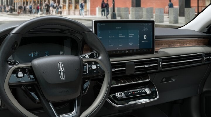 The center screen of the new 2025 Lincoln Corsair® SUV is showcased with its SYNC® 4 capabilities highlighted | Rogers Lincoln in Midland TX