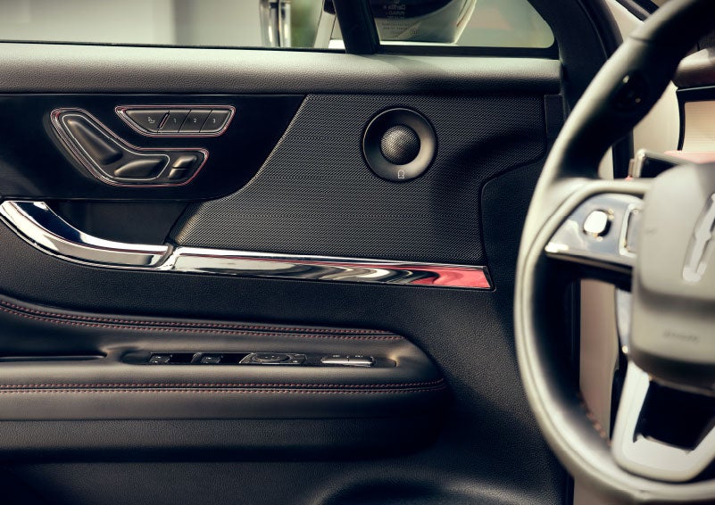 An audio speaker is shown in the driver's side door of a 2024 Lincoln Corsair® SUV. | Rogers Lincoln in Midland TX