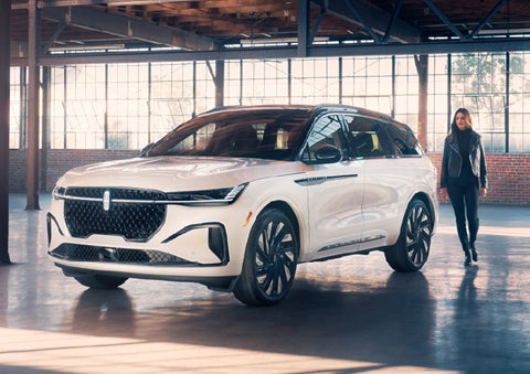 A person approaches a 2025 Lincoln Nautilus® SUV. | Rogers Lincoln in Midland TX