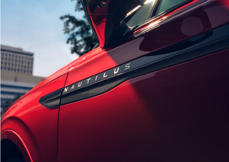 A side badge on the passenger door reads Nautilus. | Rogers Lincoln in Midland TX