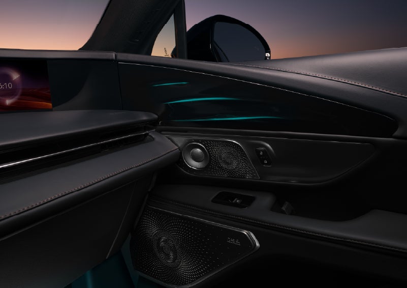 Selectable ambient lighting glows in the passenger door panel. | Rogers Lincoln in Midland TX