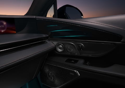 Selectable ambient lighting glows in the passenger door panel. | Rogers Lincoln in Midland TX