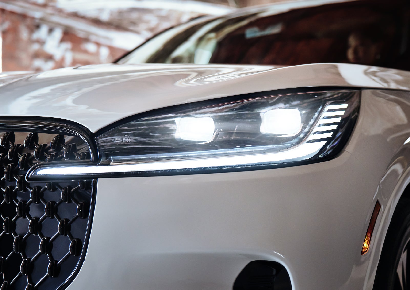 A close-up of a headlamp on the 2027 Lincoln Aviator® SUV is shown. | Rogers Lincoln in Midland TX