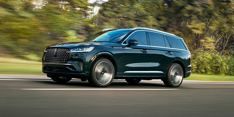 2026 Lincoln Aviator luxury SUV driving in Midland, TX